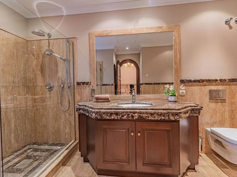 Luxury andalusian style villa that resides magnificently in one of the most prestigious and sought-after urbanizations in Marbella, Guadalmina Baja, only 100 meters from the beach and 5 minutes from Puerto Banus. The highest quality materials have been us