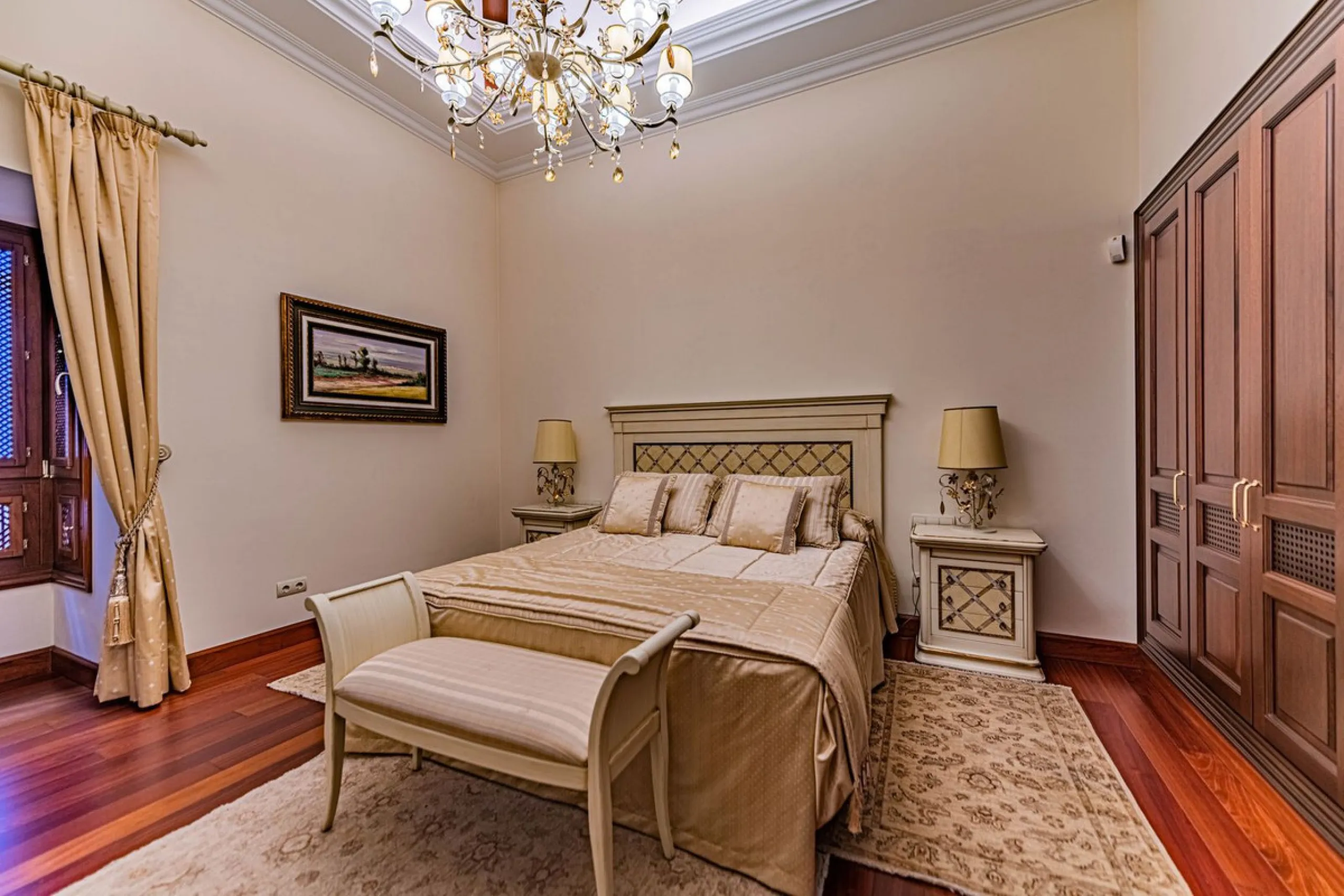 Luxury andalusian style villa that resides magnificently in one of the most prestigious and sought-after urbanizations in Marbella, Guadalmina Baja, only 100 meters from the beach and 5 minutes from Puerto Banus. The highest quality materials have been us
