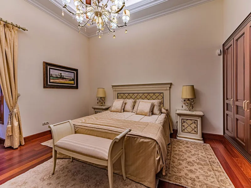 Luxury andalusian style villa that resides magnificently in one of the most prestigious and sought-after urbanizations in Marbella, Guadalmina Baja, only 100 meters from the beach and 5 minutes from Puerto Banus. The highest quality materials have been us