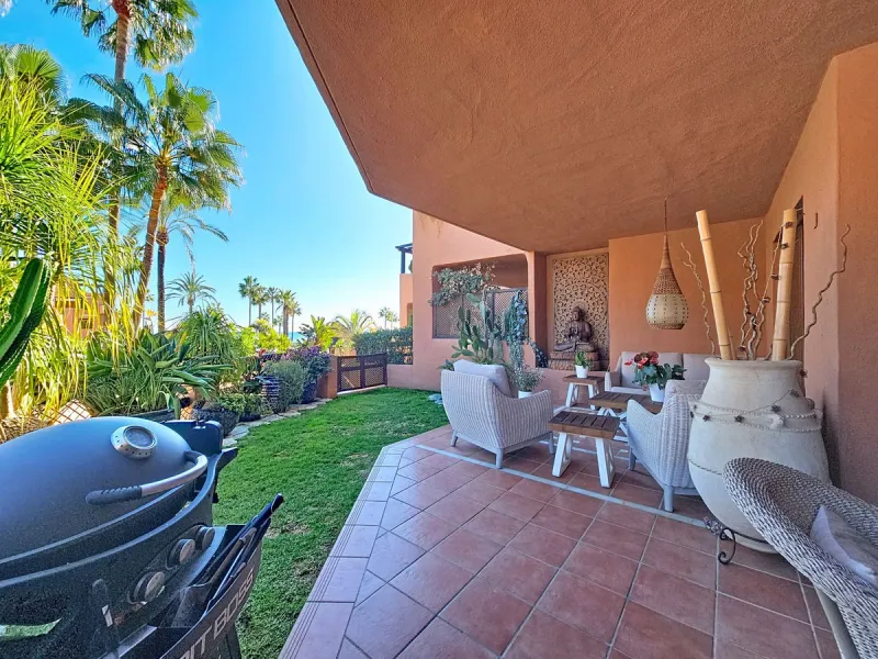 Fantastic Ground-Floor Apartment with Private Garden in Luxury Beachfront Complex.