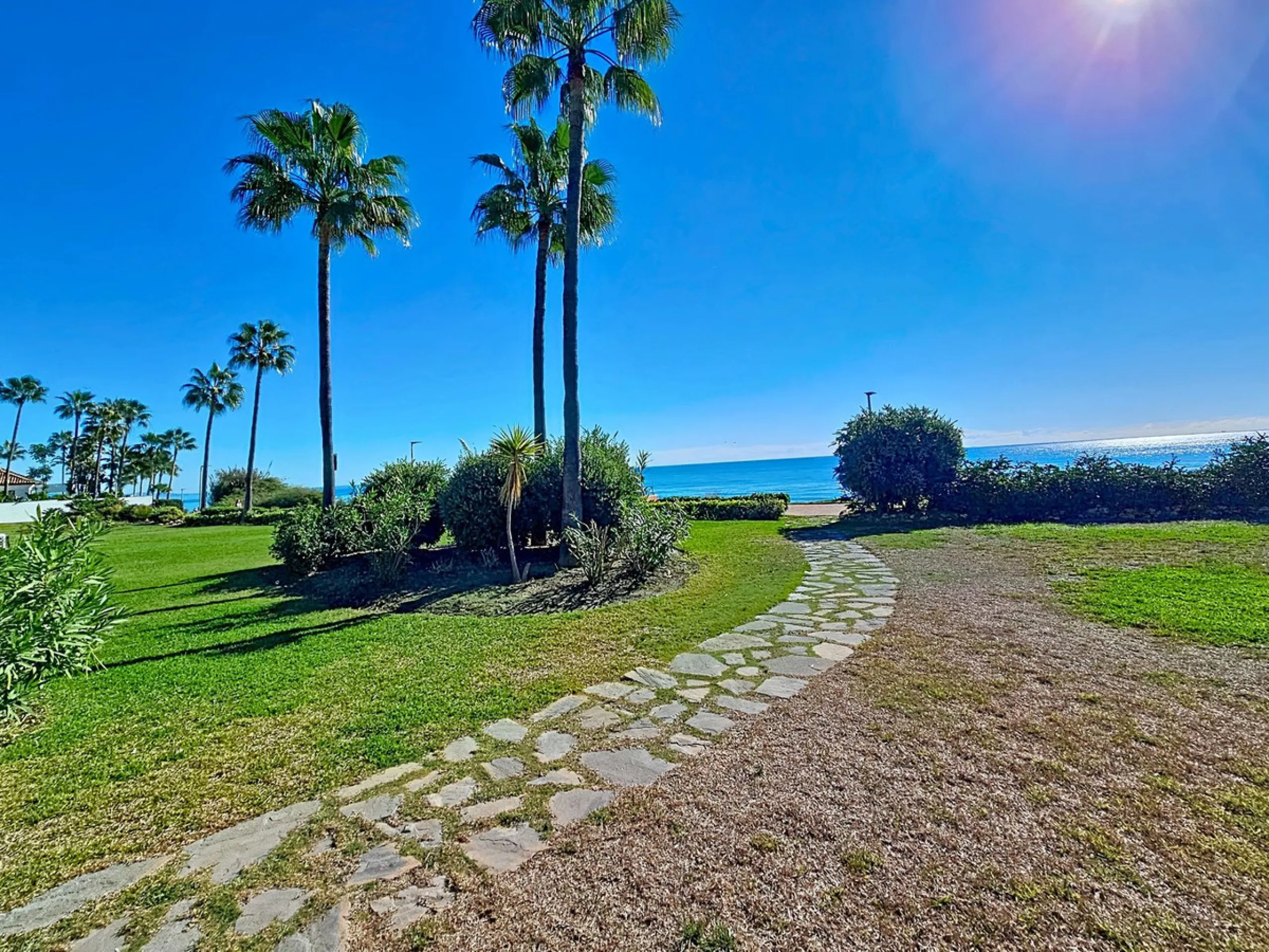 Fantastic Ground-Floor Apartment with Private Garden in Luxury Beachfront Complex.