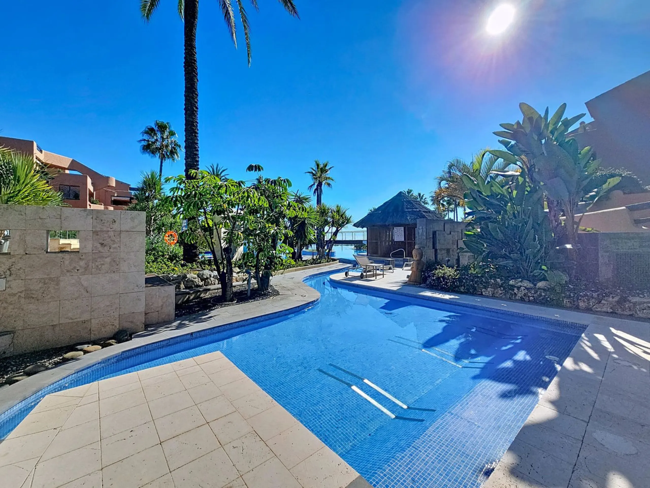 Fantastic Ground-Floor Apartment with Private Garden in Luxury Beachfront Complex.