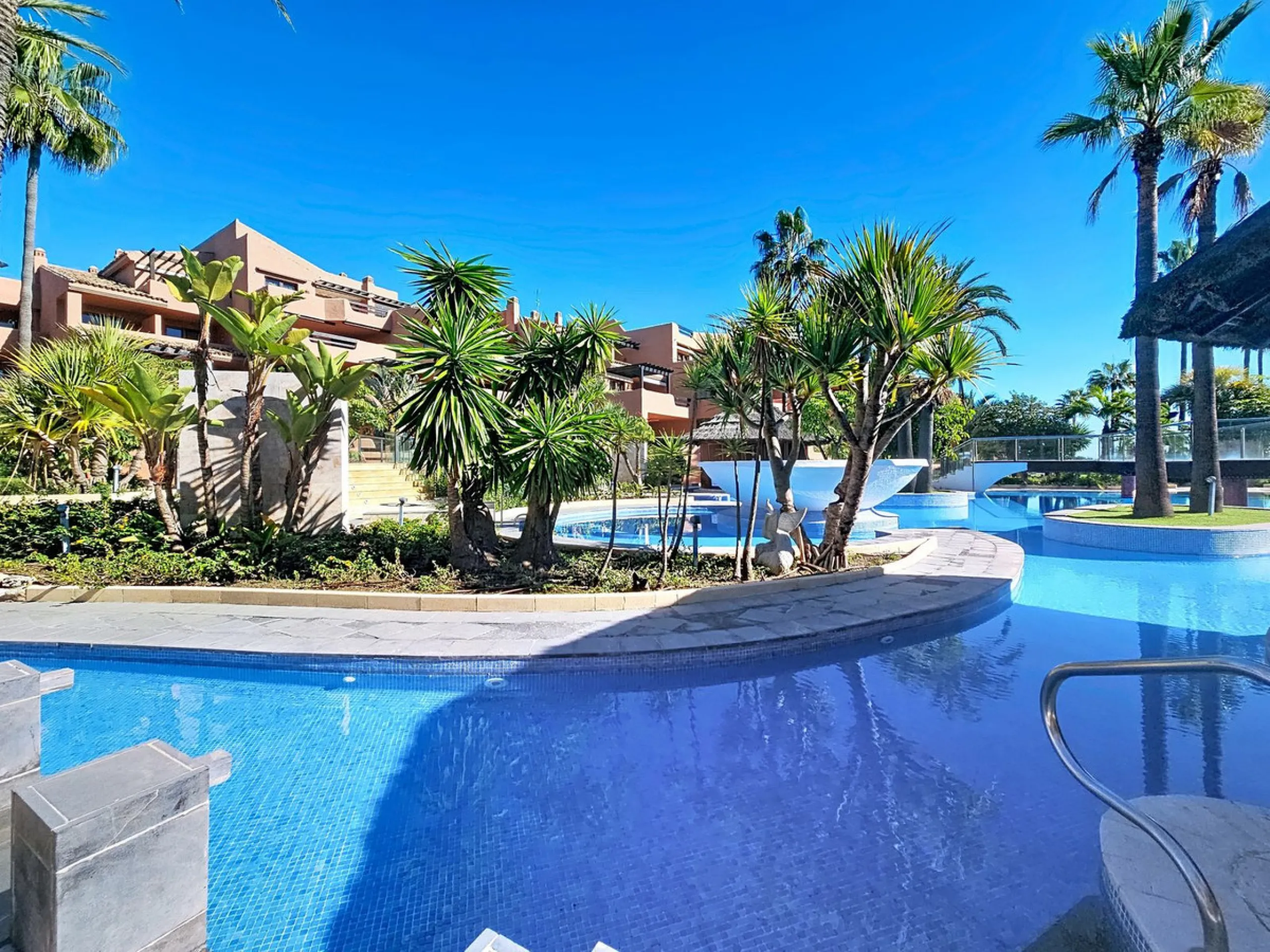 Fantastic Ground-Floor Apartment with Private Garden in Luxury Beachfront Complex.
