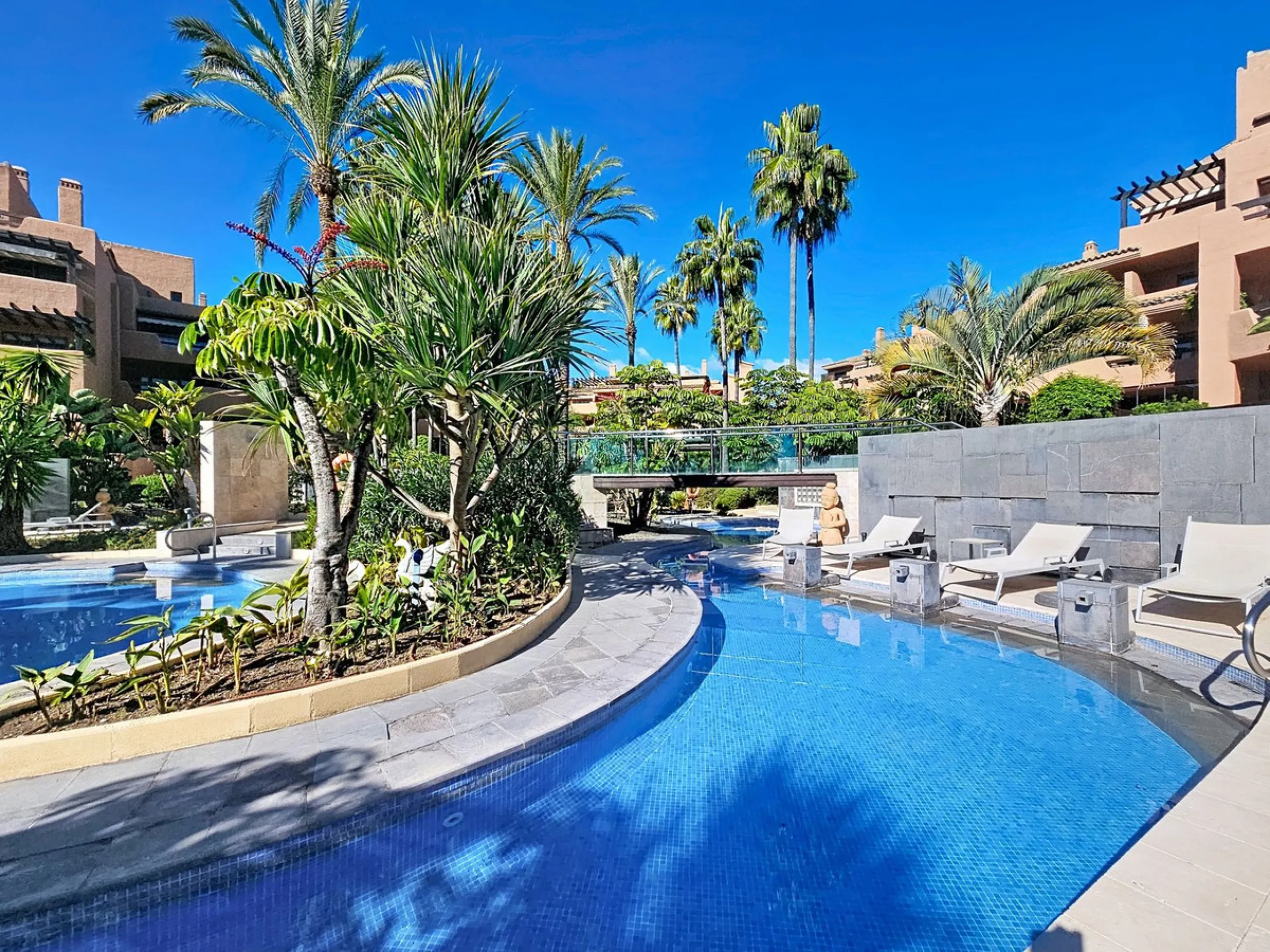 Fantastic Ground-Floor Apartment with Private Garden in Luxury Beachfront Complex.