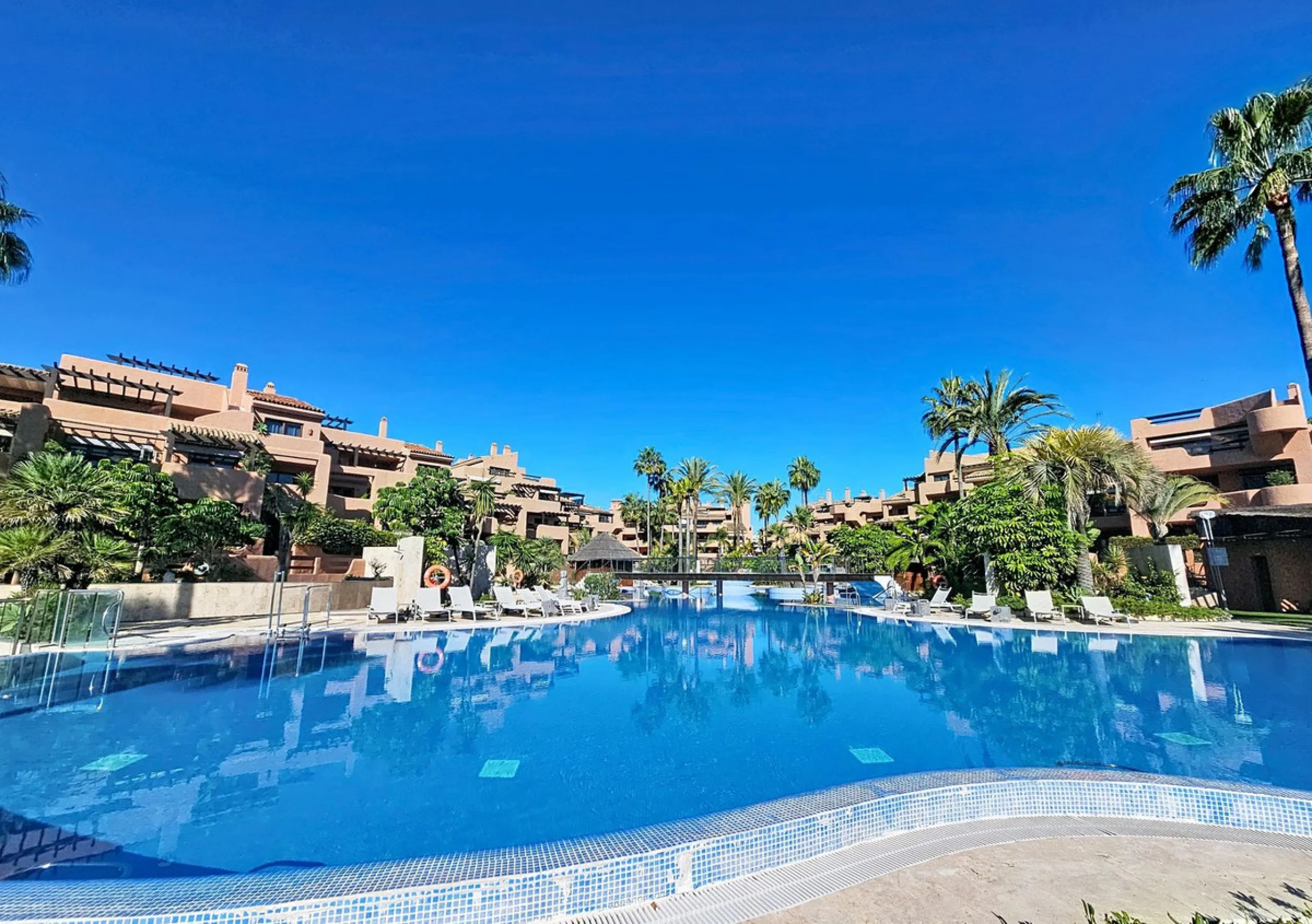 Fantastic Ground-Floor Apartment with Private Garden in Luxury Beachfront Complex.