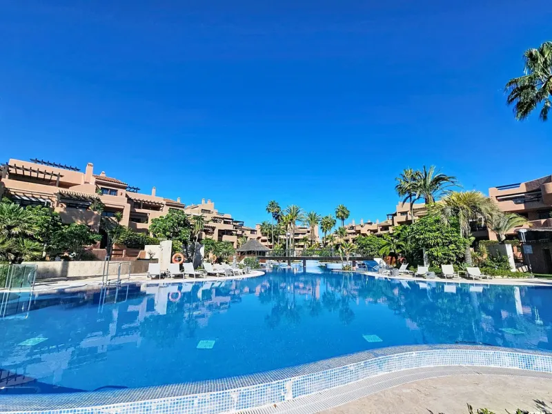 Fantastic Ground-Floor Apartment with Private Garden in Luxury Beachfront Complex.