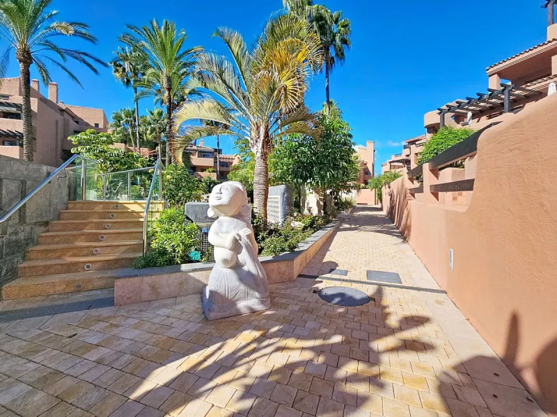 Fantastic Ground-Floor Apartment with Private Garden in Luxury Beachfront Complex.