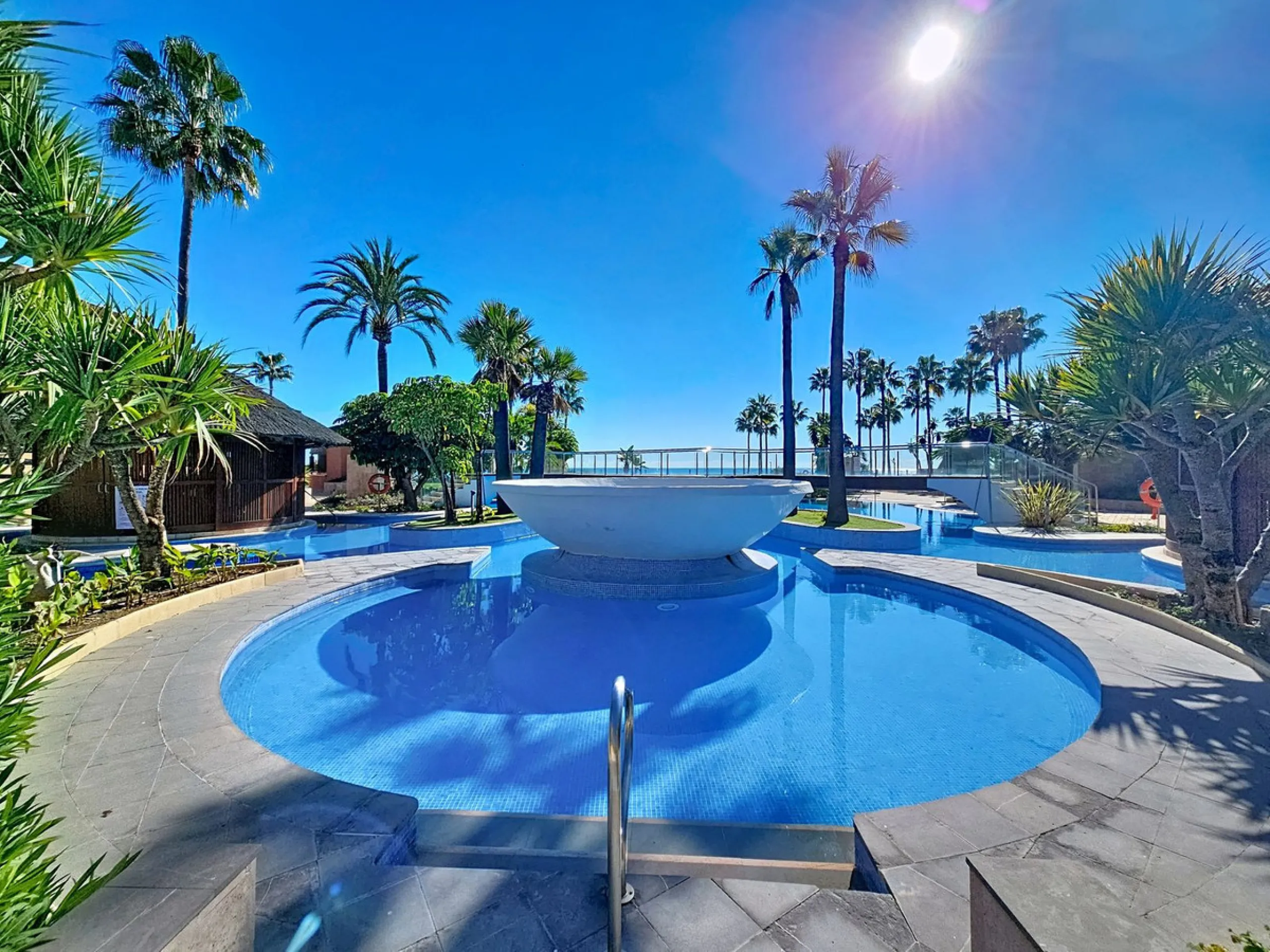 Fantastic Ground-Floor Apartment with Private Garden in Luxury Beachfront Complex.