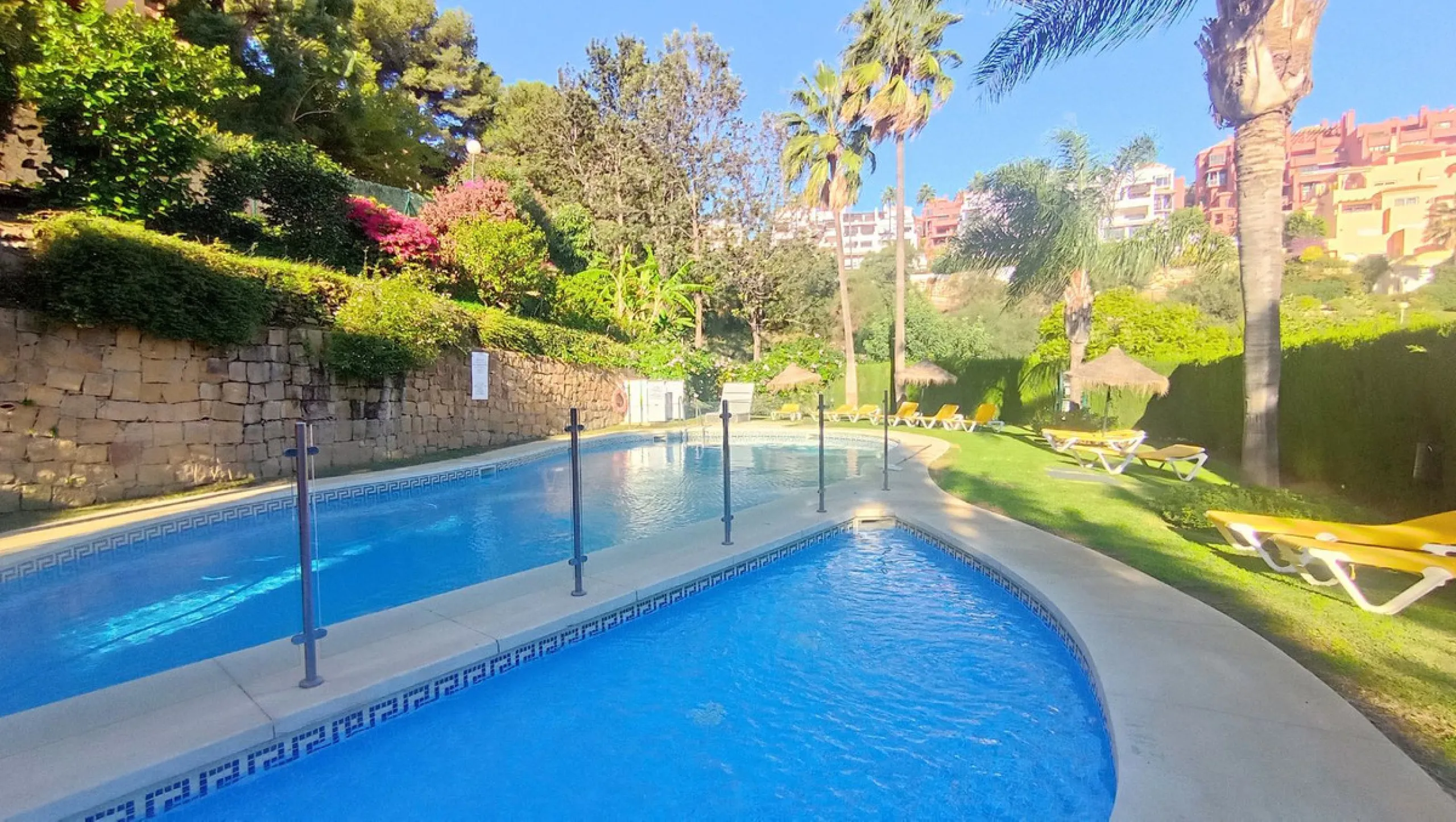 Stunning terraces with sea and mountain views. Over 60 square meters of covered and uncovered terraces. Immaculate two-story penthouse. Built-in interior staircase provides access to the upper level. The ground floor comprises two bedrooms and two full ba