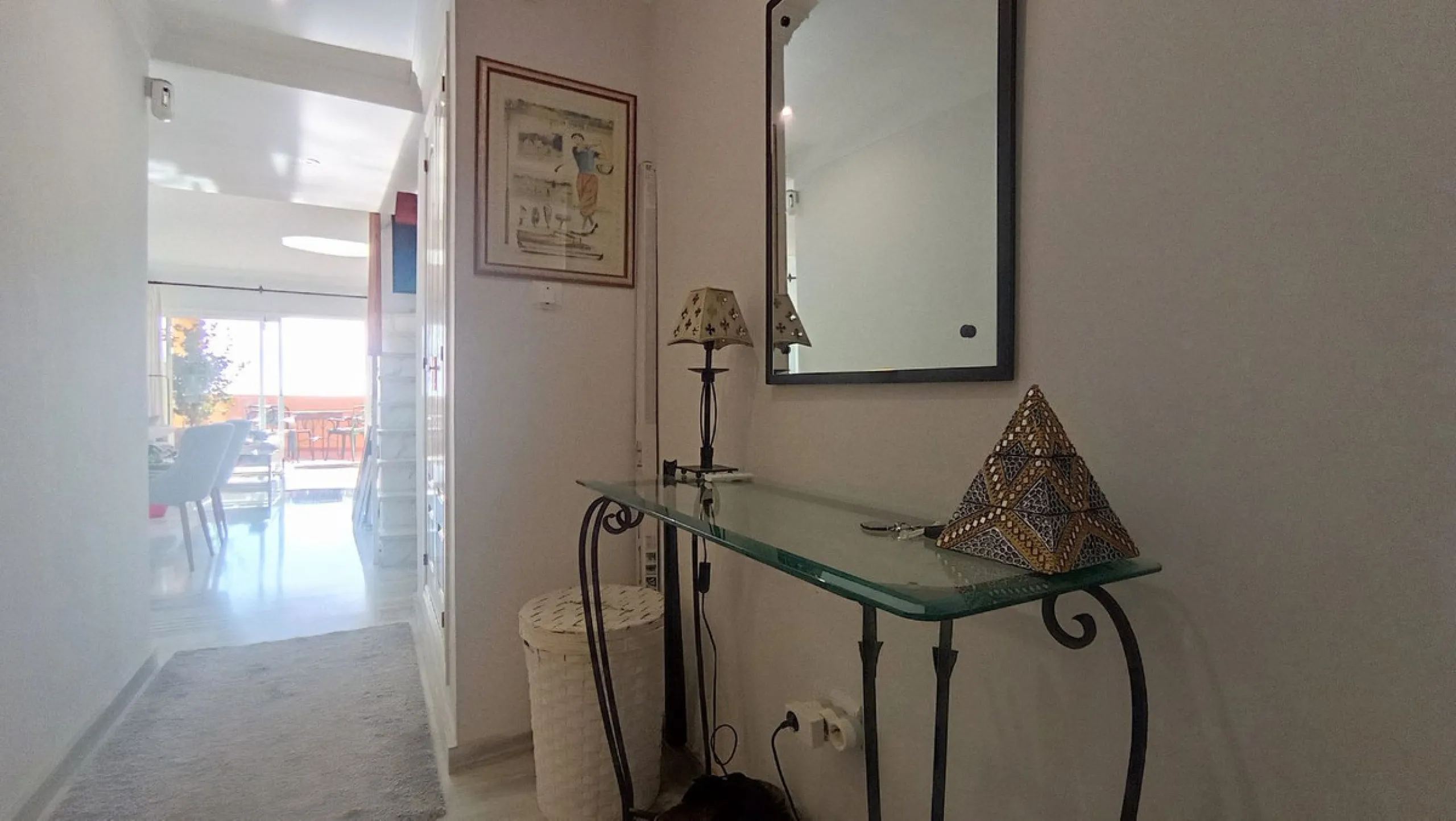 Stunning terraces with sea and mountain views. Over 60 square meters of covered and uncovered terraces. Immaculate two-story penthouse. Built-in interior staircase provides access to the upper level. The ground floor comprises two bedrooms and two full ba