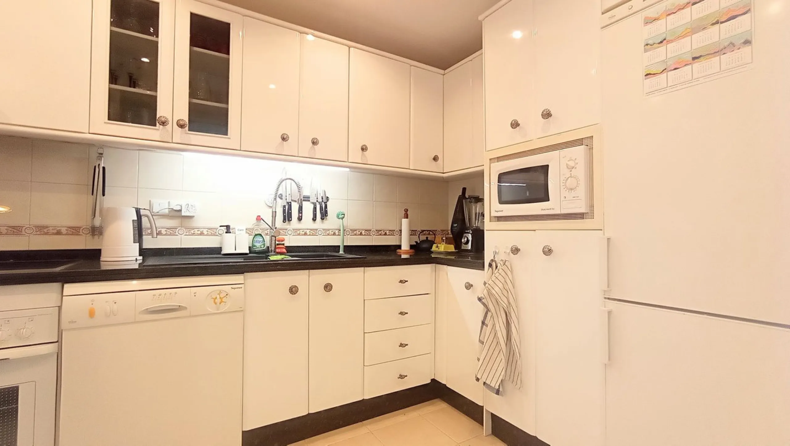 Stunning terraces with sea and mountain views. Over 60 square meters of covered and uncovered terraces. Immaculate two-story penthouse. Built-in interior staircase provides access to the upper level. The ground floor comprises two bedrooms and two full ba