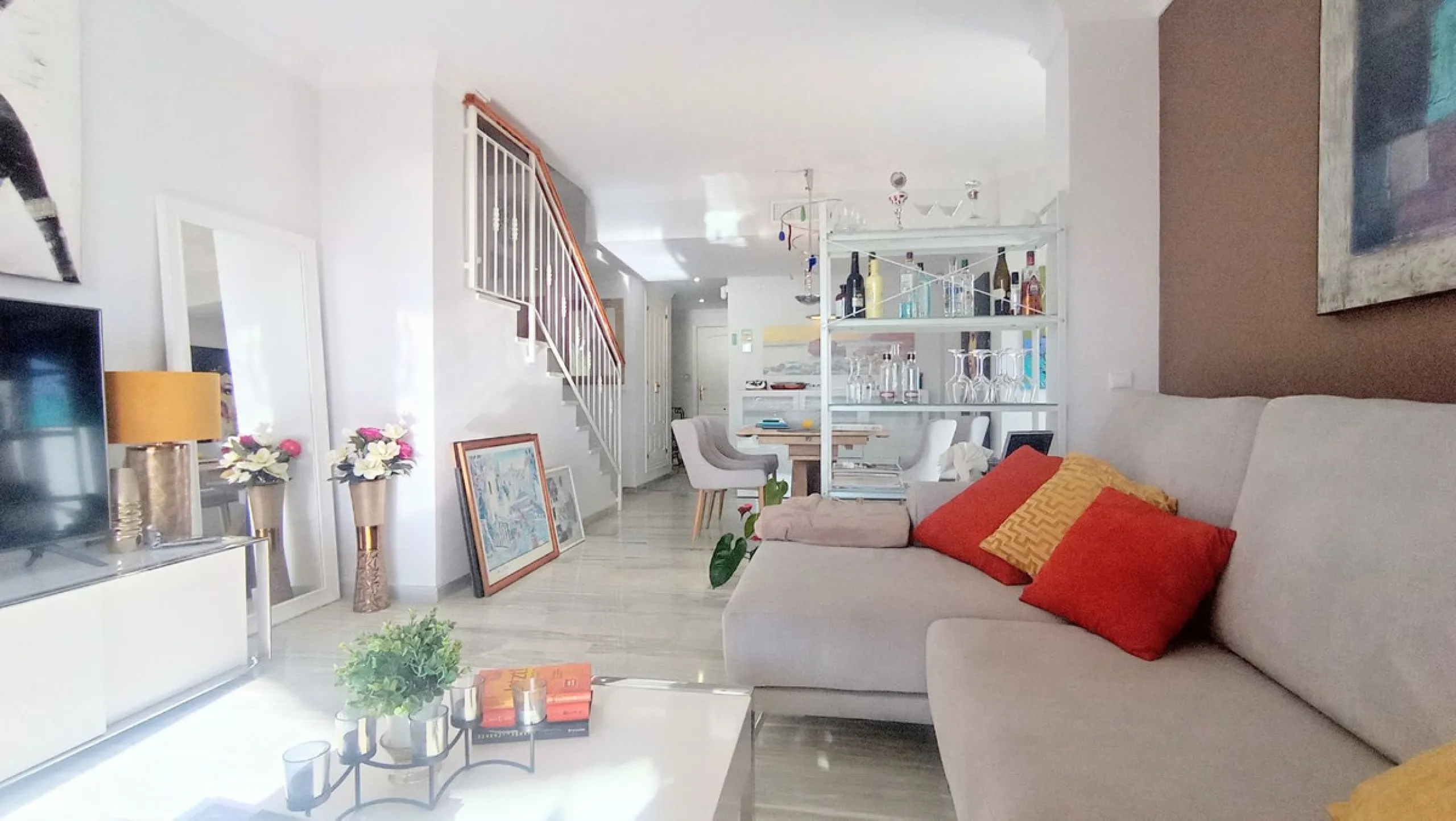 Stunning terraces with sea and mountain views. Over 60 square meters of covered and uncovered terraces. Immaculate two-story penthouse. Built-in interior staircase provides access to the upper level. The ground floor comprises two bedrooms and two full ba