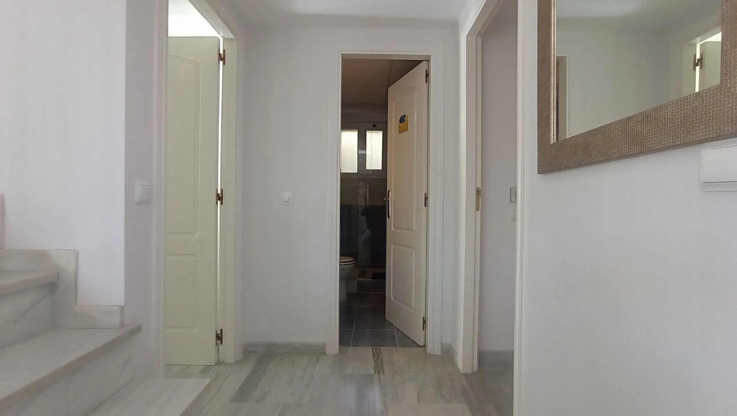 Stunning terraces with sea and mountain views. Over 60 square meters of covered and uncovered terraces. Immaculate two-story penthouse. Built-in interior staircase provides access to the upper level. The ground floor comprises two bedrooms and two full ba