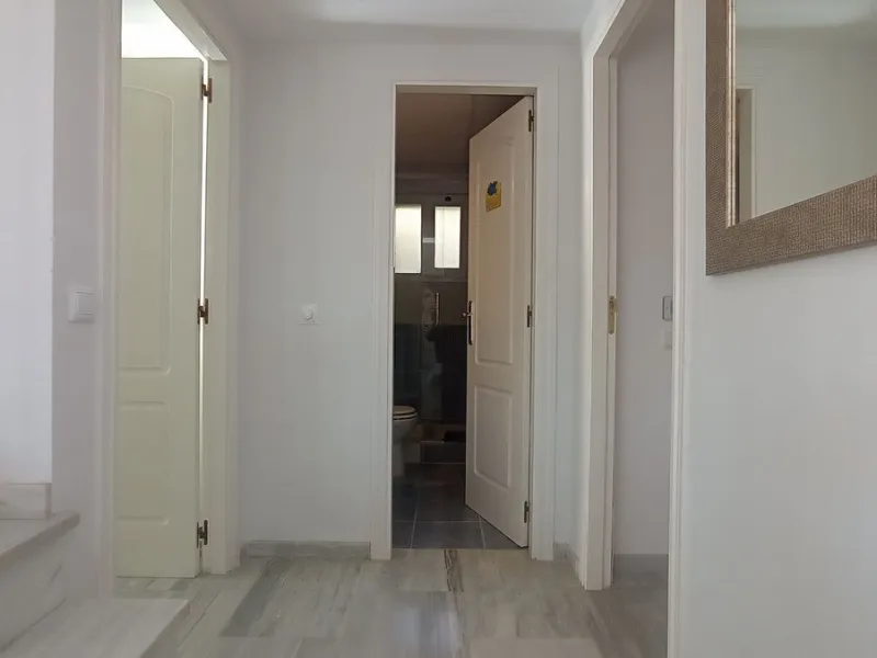 Stunning terraces with sea and mountain views. Over 60 square meters of covered and uncovered terraces. Immaculate two-story penthouse. Built-in interior staircase provides access to the upper level. The ground floor comprises two bedrooms and two full ba