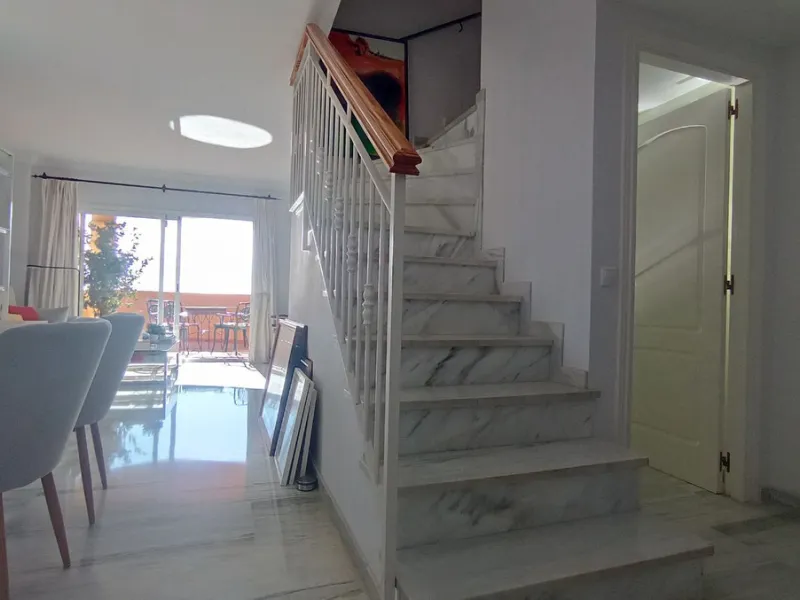 Stunning terraces with sea and mountain views. Over 60 square meters of covered and uncovered terraces. Immaculate two-story penthouse. Built-in interior staircase provides access to the upper level. The ground floor comprises two bedrooms and two full ba