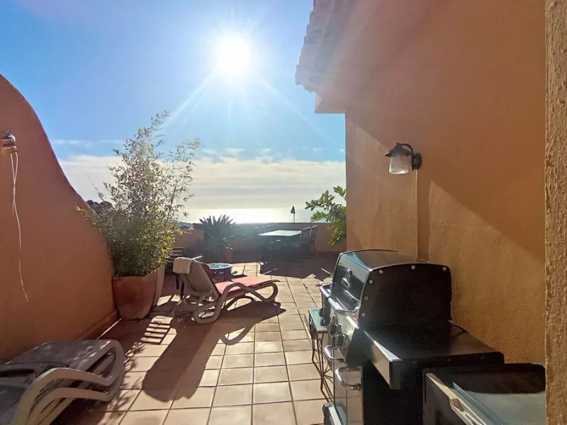 Stunning terraces with sea and mountain views. Over 60 square meters of covered and uncovered terraces. Immaculate two-story penthouse. Built-in interior staircase provides access to the upper level. The ground floor comprises two bedrooms and two full ba