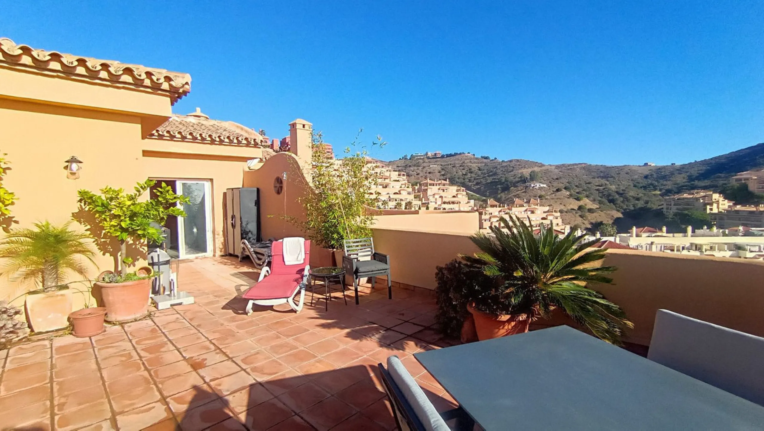 Stunning terraces with sea and mountain views. Over 60 square meters of covered and uncovered terraces. Immaculate two-story penthouse. Built-in interior staircase provides access to the upper level. The ground floor comprises two bedrooms and two full ba