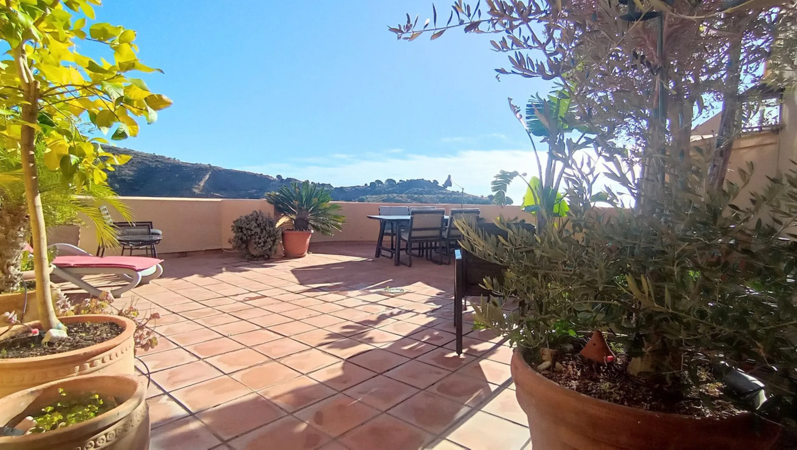 Stunning terraces with sea and mountain views. Over 60 square meters of covered and uncovered terraces. Immaculate two-story penthouse. Built-in interior staircase provides access to the upper level. The ground floor comprises two bedrooms and two full ba