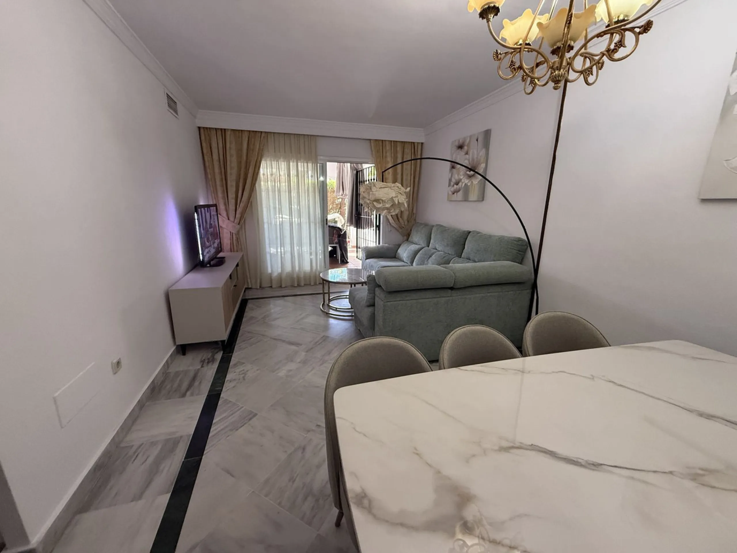 For sale apartment in the "Dama de Noche" complex, located on the ground floor with an underground parking space. It features two bedrooms, two bathrooms, a living room, a large terrace, and a private garden belonging to the apartment.