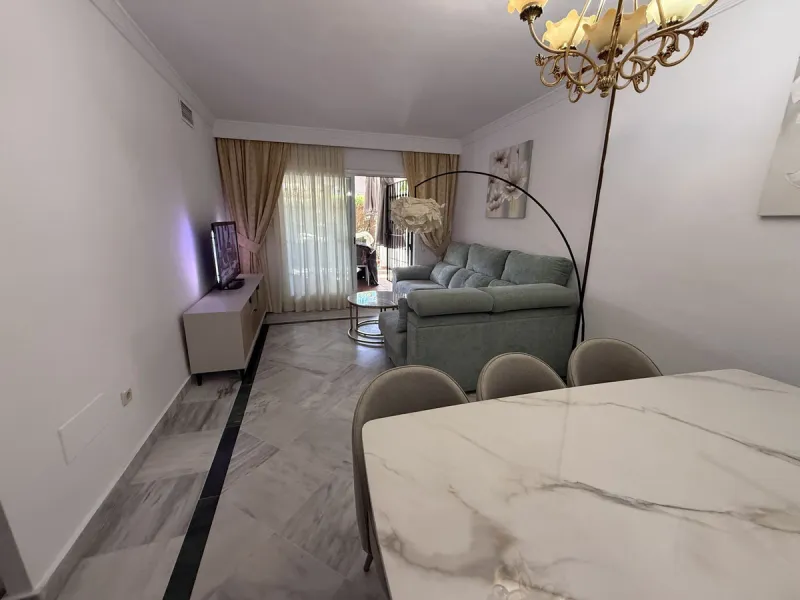 For sale apartment in the "Dama de Noche" complex, located on the ground floor with an underground parking space. It features two bedrooms, two bathrooms, a living room, a large terrace, and a private garden belonging to the apartment.