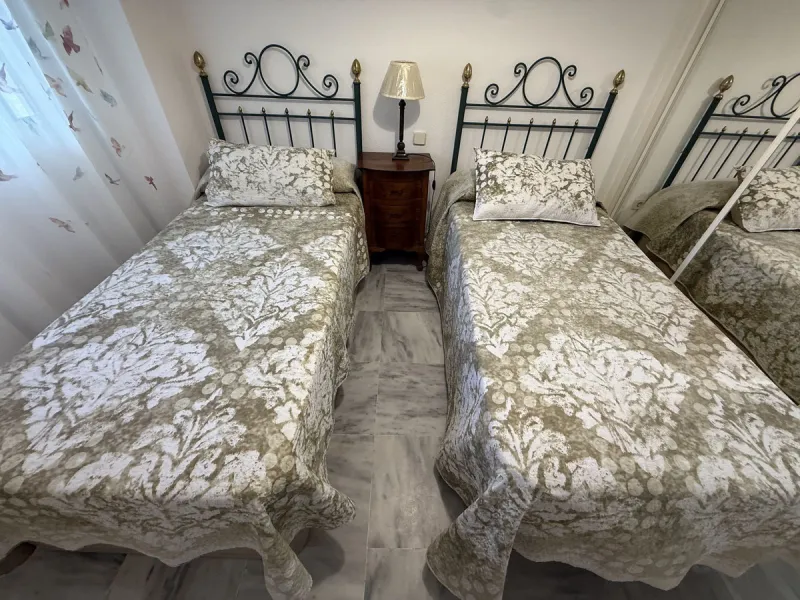 For sale apartment in the "Dama de Noche" complex, located on the ground floor with an underground parking space. It features two bedrooms, two bathrooms, a living room, a large terrace, and a private garden belonging to the apartment.
