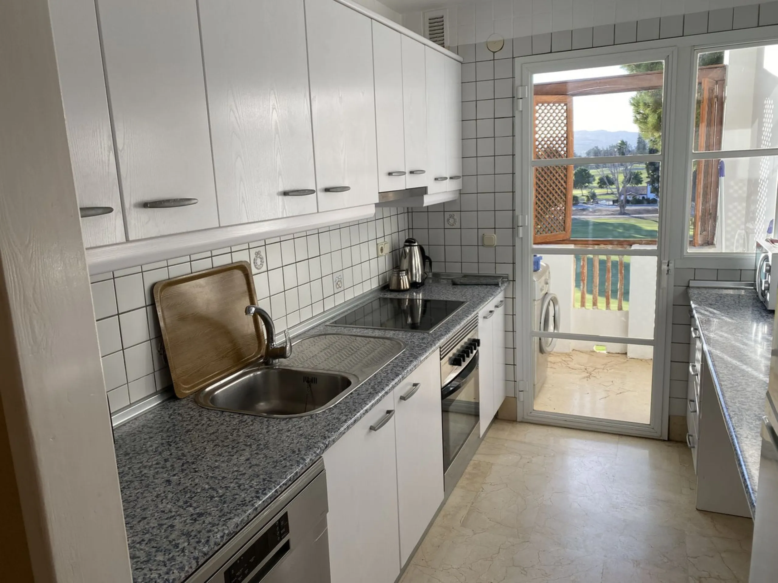 A WONDERFUL 3 BEDROOM APARTMENT OVERLOOKING THE FAIRWAYS OF LOS LARGOS GOLF COURSE IN THIS HIGHLY SOUGHT AFTER GATED URBANIZATION. A VERY RARE FIND.  OPEN TO AN OFFER