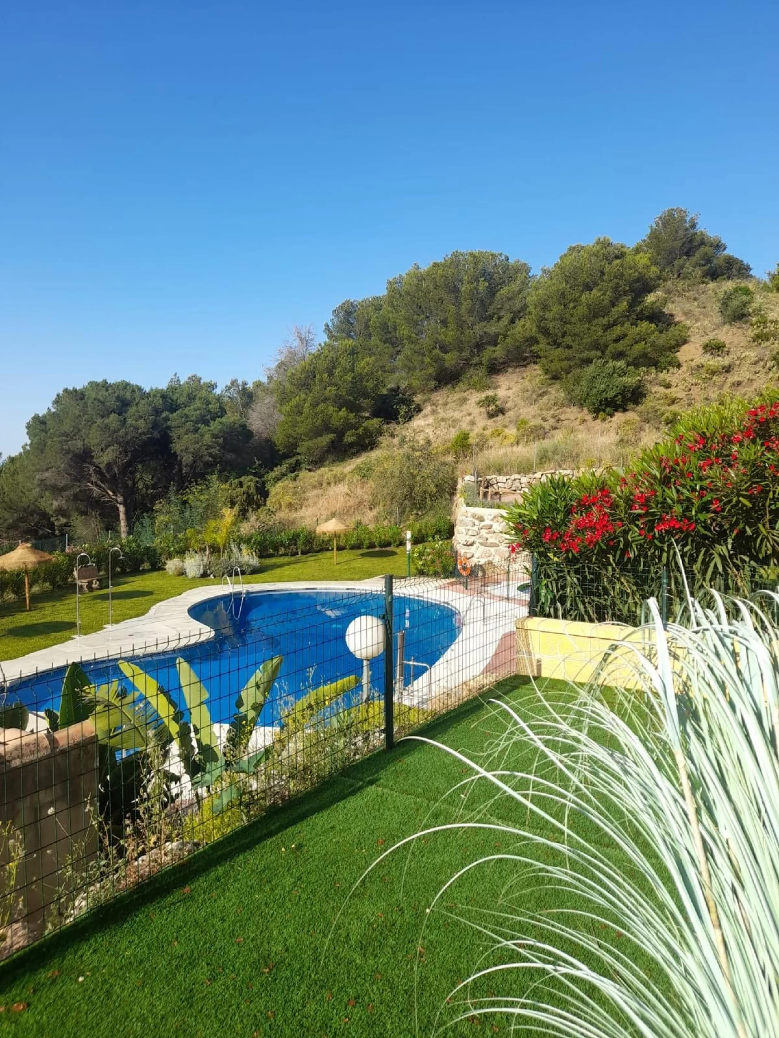 FIRST TIME ON THE MARKET FOR MANY YEARS. A FABULOUS OPPORTUNITY TO ACQUIRE A SPACIOUS, VERY WELL PRESENTED, GROUND FLOOR APARTMENT IN WHAT IS WIDELY CONSIDERED TO BE ONE OF THE BEST URBANIZATIONS IN MIJAS