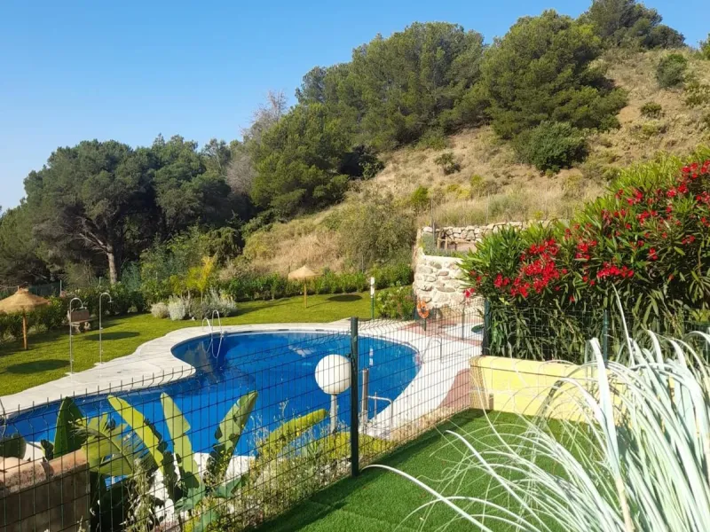 FIRST TIME ON THE MARKET FOR MANY YEARS. A FABULOUS OPPORTUNITY TO ACQUIRE A SPACIOUS, VERY WELL PRESENTED, GROUND FLOOR APARTMENT IN WHAT IS WIDELY CONSIDERED TO BE ONE OF THE BEST URBANIZATIONS IN MIJAS