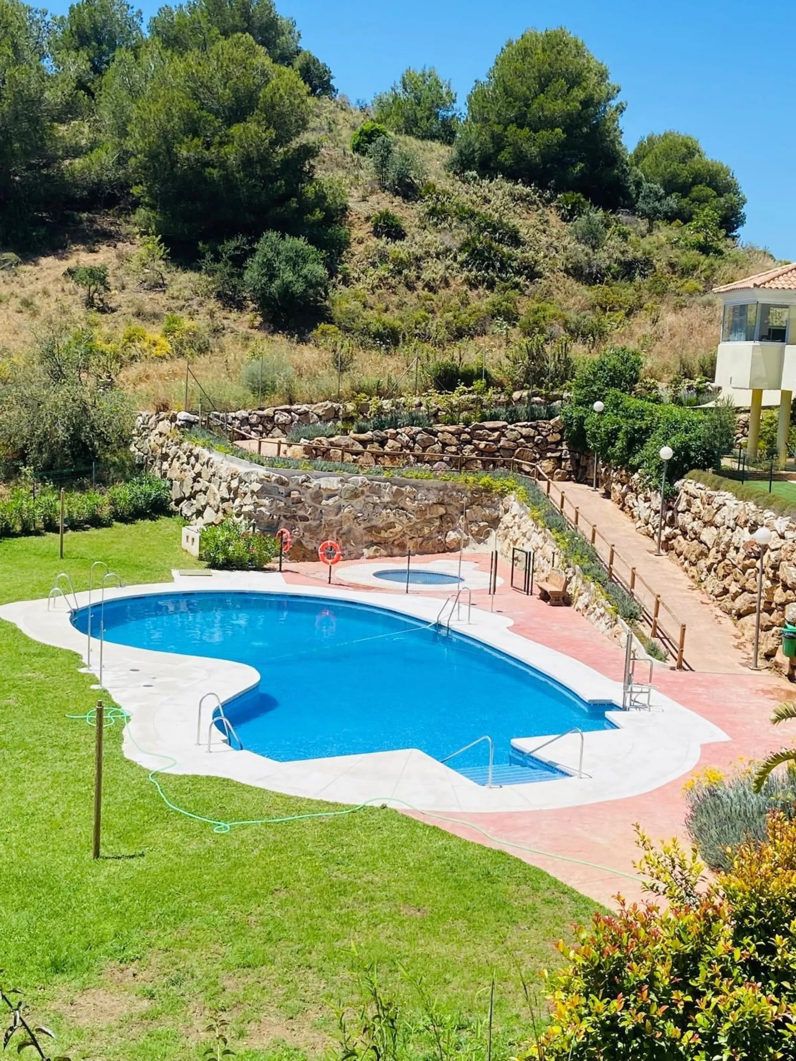 FIRST TIME ON THE MARKET FOR MANY YEARS. A FABULOUS OPPORTUNITY TO ACQUIRE A SPACIOUS, VERY WELL PRESENTED, GROUND FLOOR APARTMENT IN WHAT IS WIDELY CONSIDERED TO BE ONE OF THE BEST URBANIZATIONS IN MIJAS