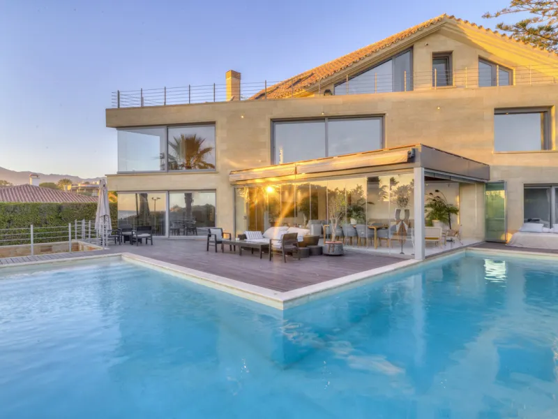 In one of the most sought-after locations along Marbella's coastline, this spectacular contemporary villa rises literally on the sand, offering a truly unique and unrivalled beachfront living experience.