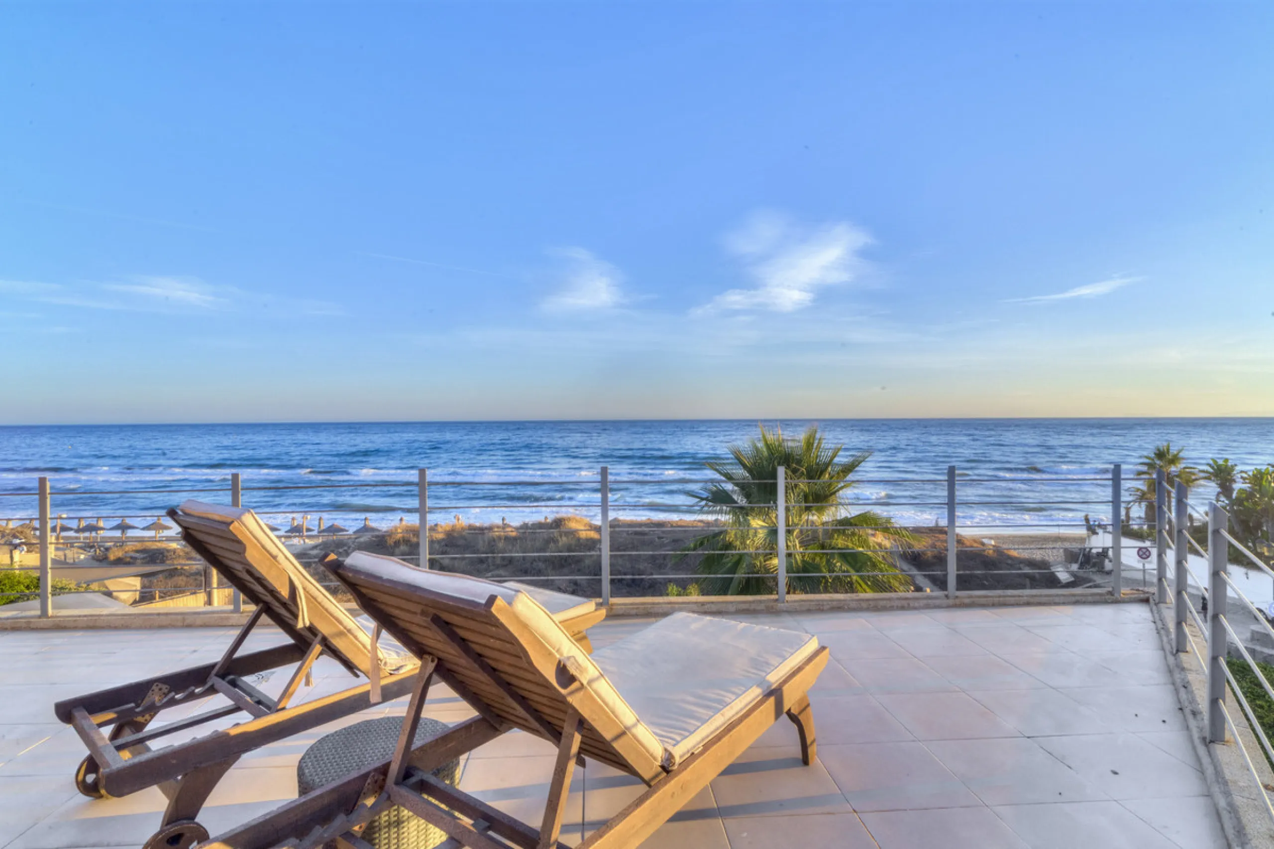 In one of the most sought-after locations along Marbella's coastline, this spectacular contemporary villa rises literally on the sand, offering a truly unique and unrivalled beachfront living experience.