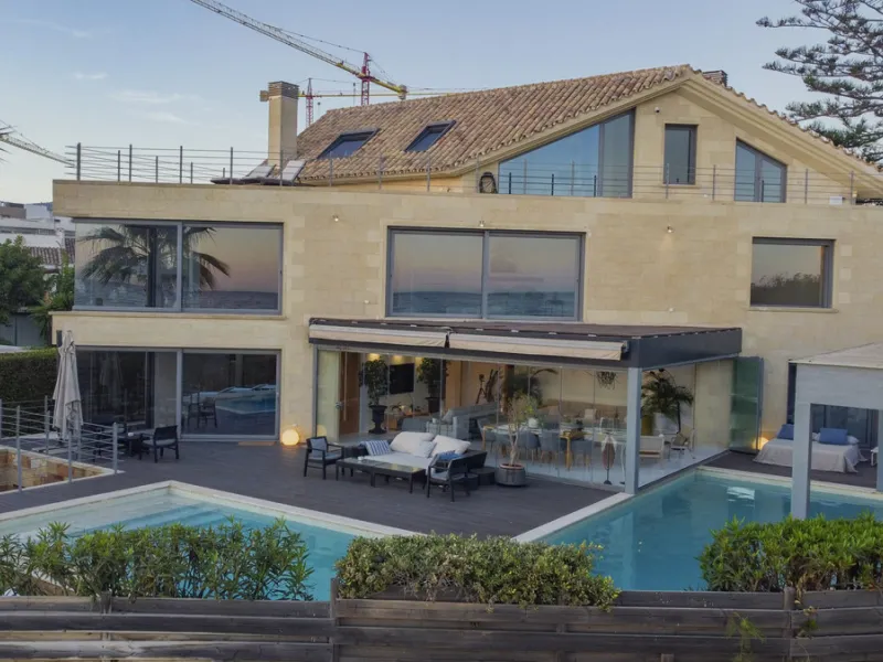 In one of the most sought-after locations along Marbella's coastline, this spectacular contemporary villa rises literally on the sand, offering a truly unique and unrivalled beachfront living experience.