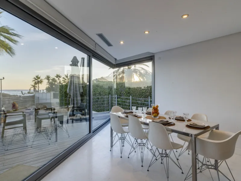 In one of the most sought-after locations along Marbella's coastline, this spectacular contemporary villa rises literally on the sand, offering a truly unique and unrivalled beachfront living experience.