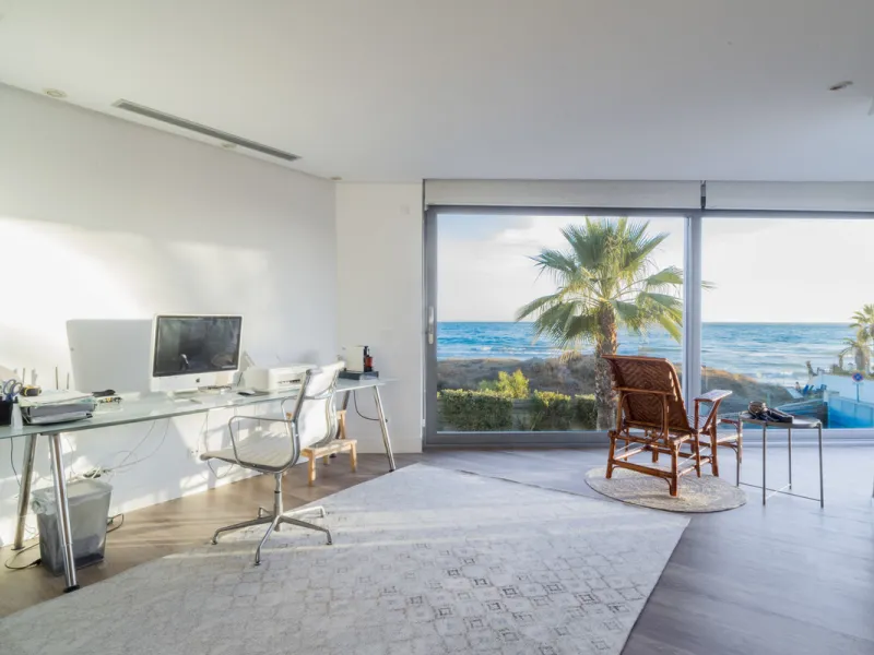 In one of the most sought-after locations along Marbella's coastline, this spectacular contemporary villa rises literally on the sand, offering a truly unique and unrivalled beachfront living experience.