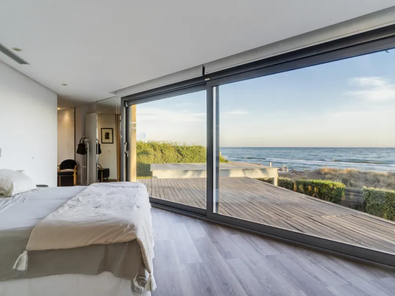 In one of the most sought-after locations along Marbella's coastline, this spectacular contemporary villa rises literally on the sand, offering a truly unique and unrivalled beachfront living experience.