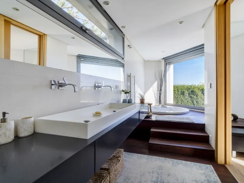 In one of the most sought-after locations along Marbella's coastline, this spectacular contemporary villa rises literally on the sand, offering a truly unique and unrivalled beachfront living experience.