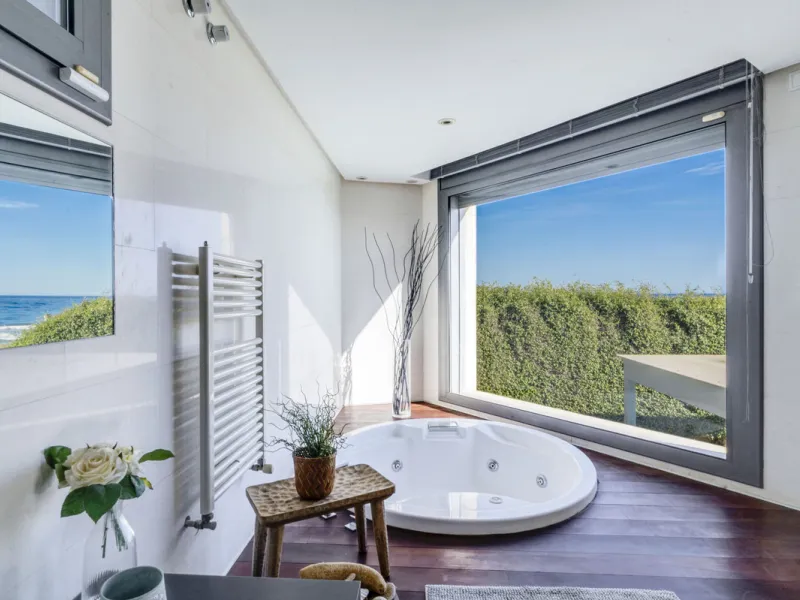 In one of the most sought-after locations along Marbella's coastline, this spectacular contemporary villa rises literally on the sand, offering a truly unique and unrivalled beachfront living experience.