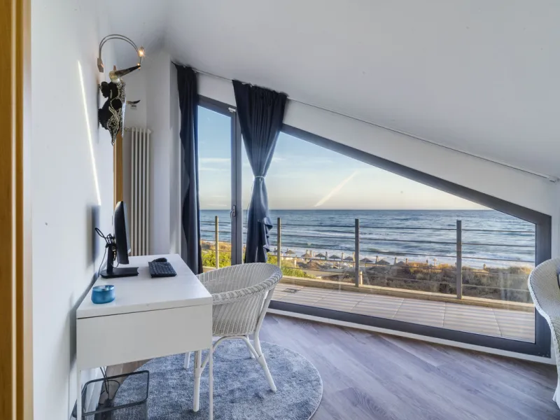 In one of the most sought-after locations along Marbella's coastline, this spectacular contemporary villa rises literally on the sand, offering a truly unique and unrivalled beachfront living experience.