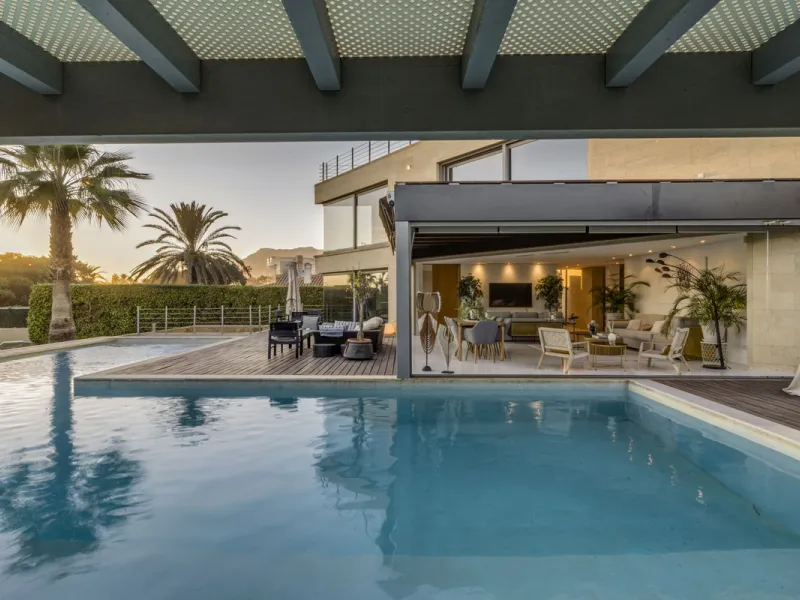 In one of the most sought-after locations along Marbella's coastline, this spectacular contemporary villa rises literally on the sand, offering a truly unique and unrivalled beachfront living experience.