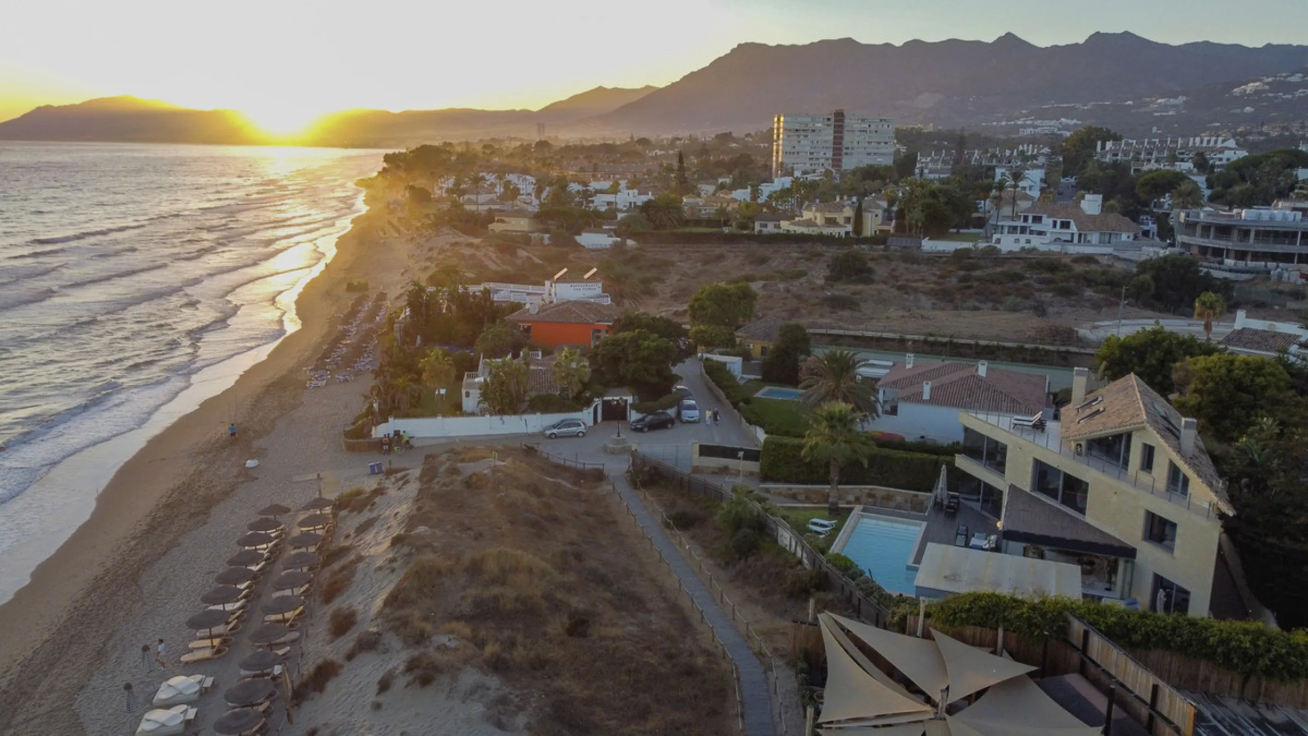 In one of the most sought-after locations along Marbella's coastline, this spectacular contemporary villa rises literally on the sand, offering a truly unique and unrivalled beachfront living experience.