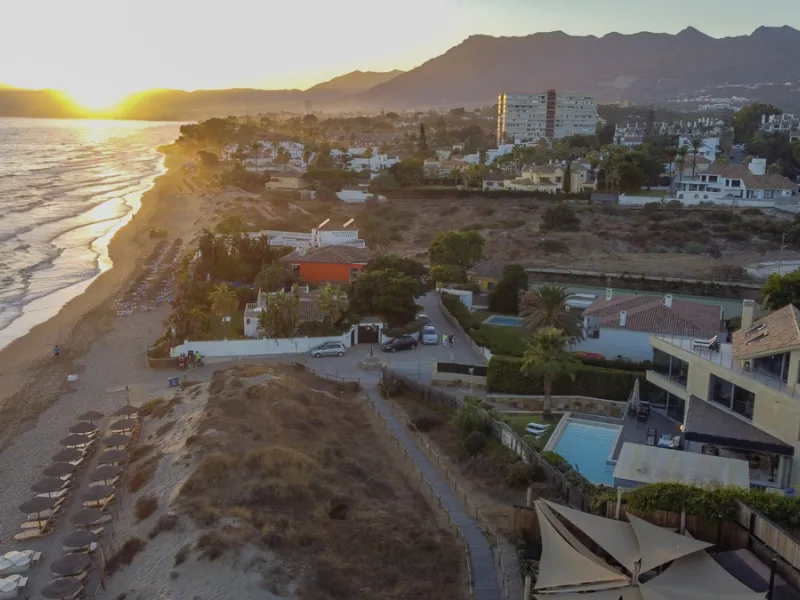 In one of the most sought-after locations along Marbella's coastline, this spectacular contemporary villa rises literally on the sand, offering a truly unique and unrivalled beachfront living experience.