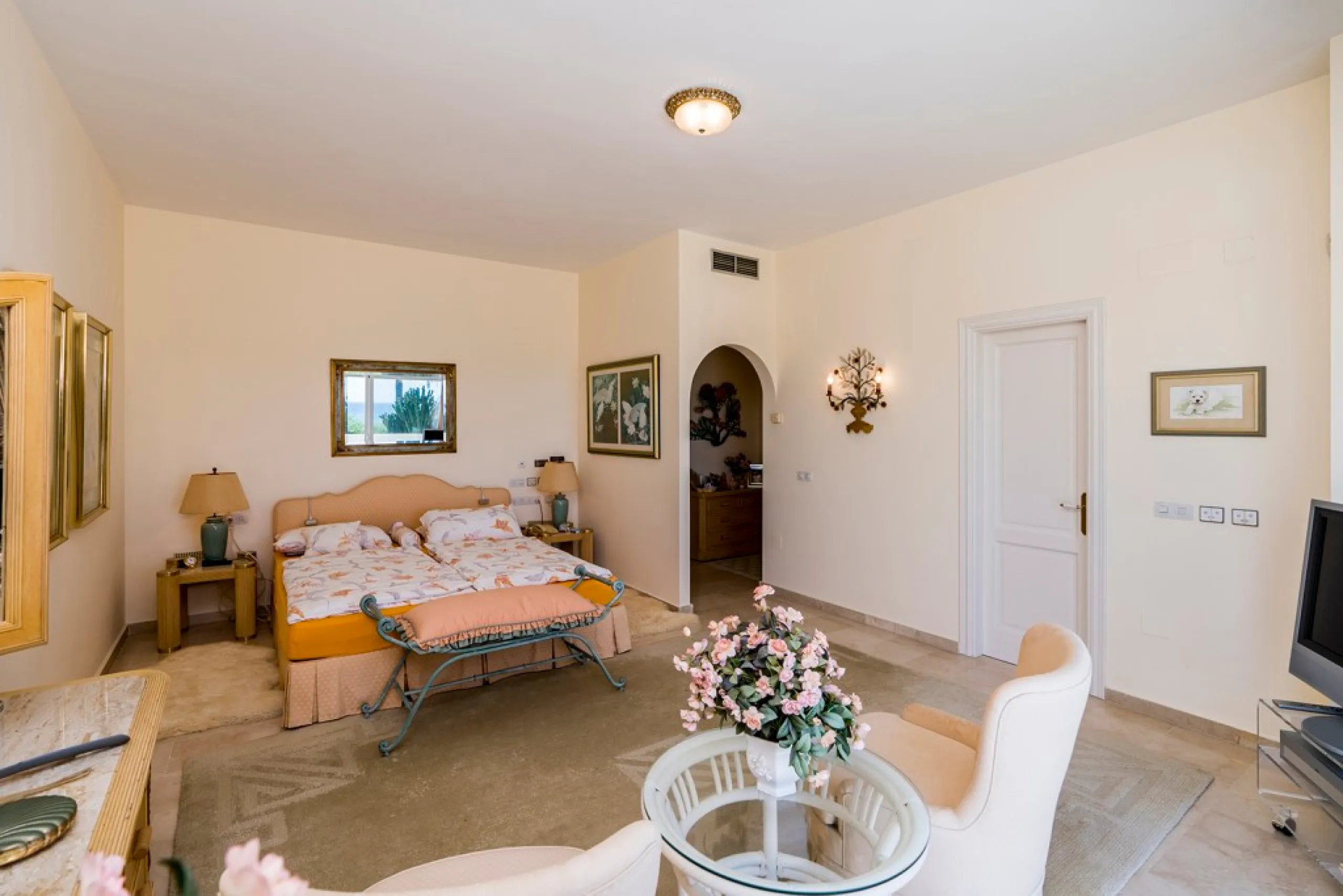 This remarkable beachfront villa, located adjacent to the renowned Nikki Beach in Elviria, East Marbella, offers an unparalleled living experience. Spread across two levels, the villa features four spacious bedrooms, each with its own en-suite bathroom, a