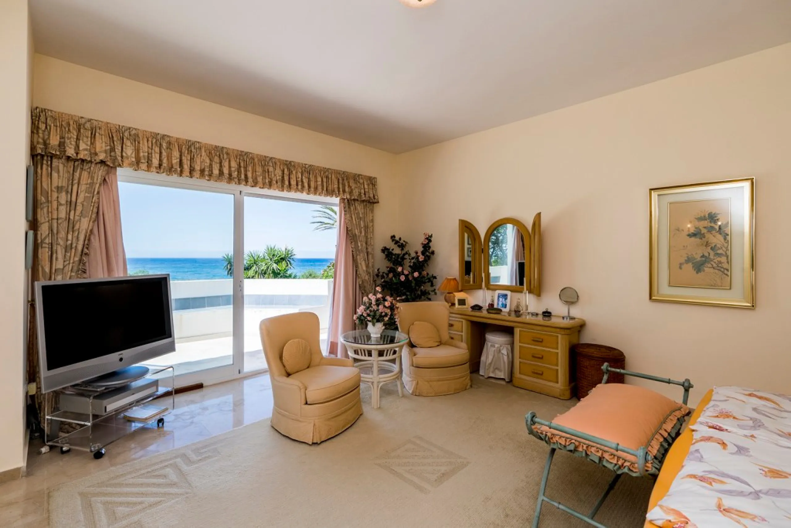This remarkable beachfront villa, located adjacent to the renowned Nikki Beach in Elviria, East Marbella, offers an unparalleled living experience. Spread across two levels, the villa features four spacious bedrooms, each with its own en-suite bathroom, a