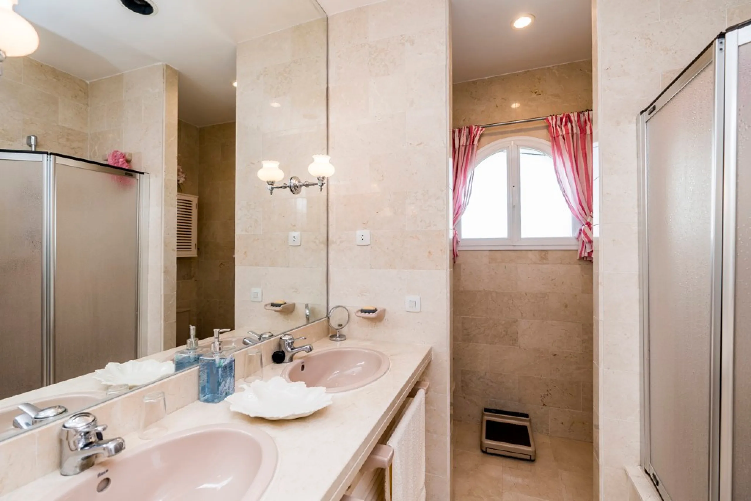 This remarkable beachfront villa, located adjacent to the renowned Nikki Beach in Elviria, East Marbella, offers an unparalleled living experience. Spread across two levels, the villa features four spacious bedrooms, each with its own en-suite bathroom, a