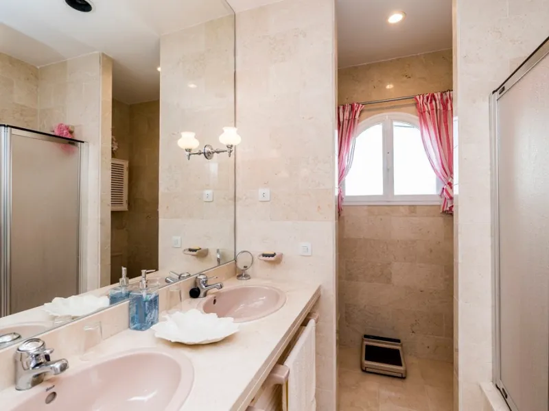 This remarkable beachfront villa, located adjacent to the renowned Nikki Beach in Elviria, East Marbella, offers an unparalleled living experience. Spread across two levels, the villa features four spacious bedrooms, each with its own en-suite bathroom, a