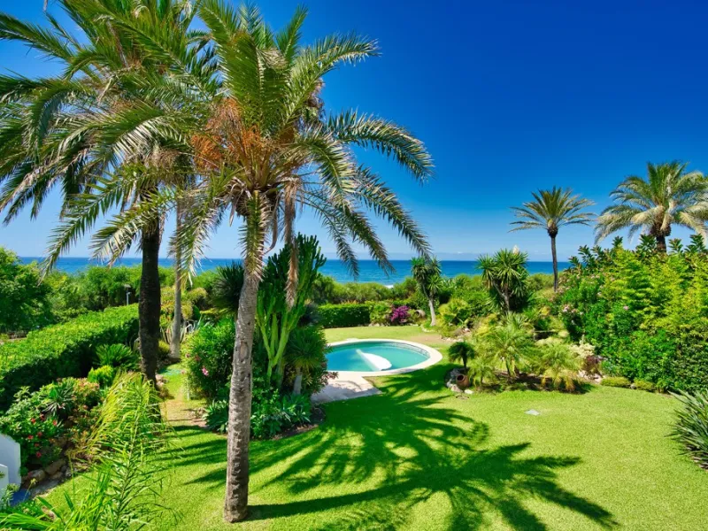 This remarkable beachfront villa, located adjacent to the renowned Nikki Beach in Elviria, East Marbella, offers an unparalleled living experience. Spread across two levels, the villa features four spacious bedrooms, each with its own en-suite bathroom, a