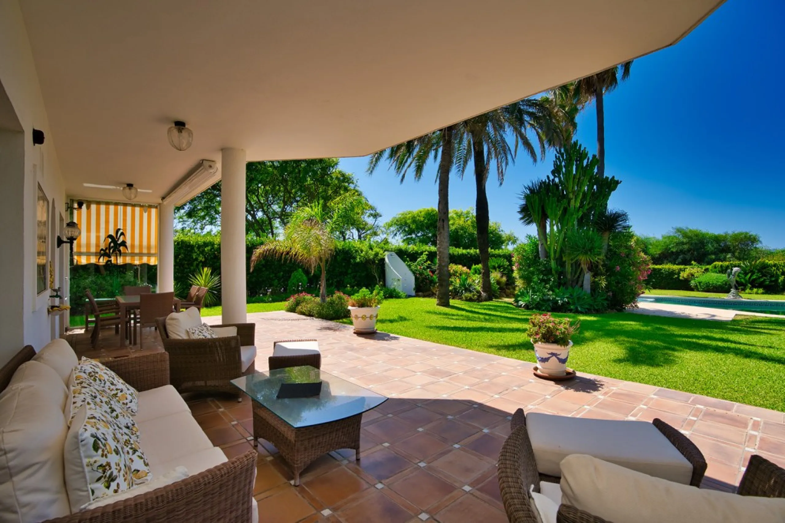 This remarkable beachfront villa, located adjacent to the renowned Nikki Beach in Elviria, East Marbella, offers an unparalleled living experience. Spread across two levels, the villa features four spacious bedrooms, each with its own en-suite bathroom, a