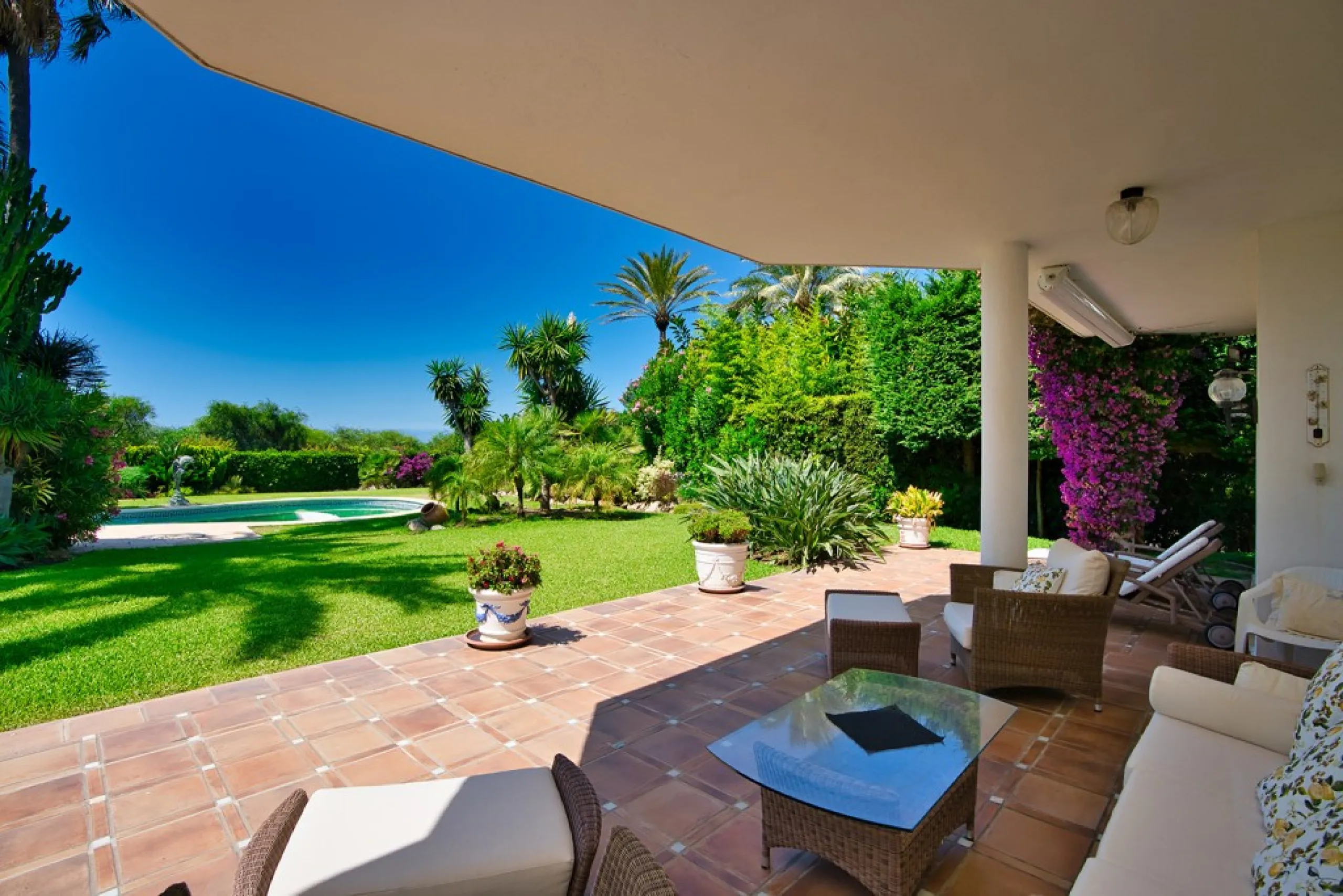 This remarkable beachfront villa, located adjacent to the renowned Nikki Beach in Elviria, East Marbella, offers an unparalleled living experience. Spread across two levels, the villa features four spacious bedrooms, each with its own en-suite bathroom, a