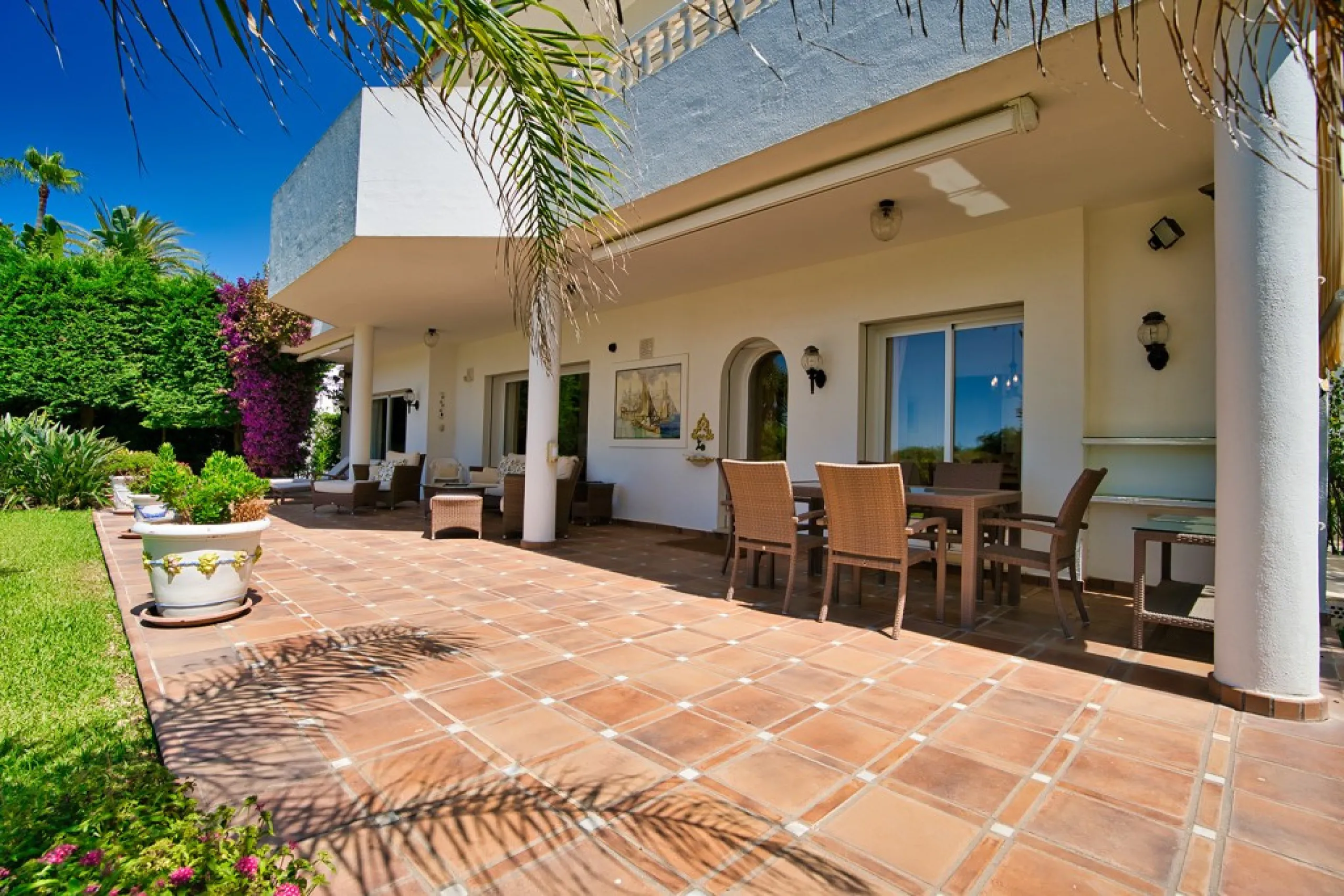 This remarkable beachfront villa, located adjacent to the renowned Nikki Beach in Elviria, East Marbella, offers an unparalleled living experience. Spread across two levels, the villa features four spacious bedrooms, each with its own en-suite bathroom, a