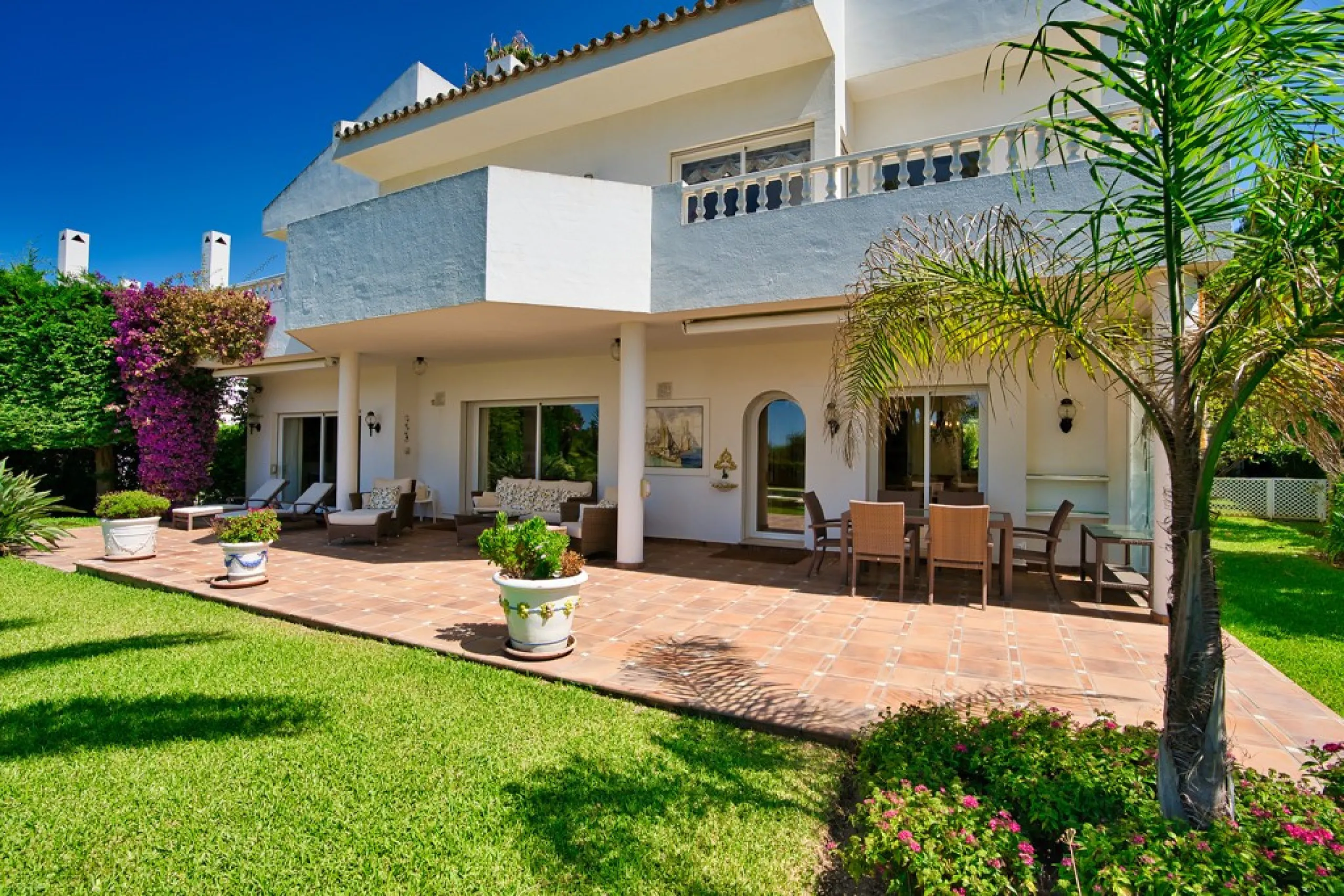 This remarkable beachfront villa, located adjacent to the renowned Nikki Beach in Elviria, East Marbella, offers an unparalleled living experience. Spread across two levels, the villa features four spacious bedrooms, each with its own en-suite bathroom, a